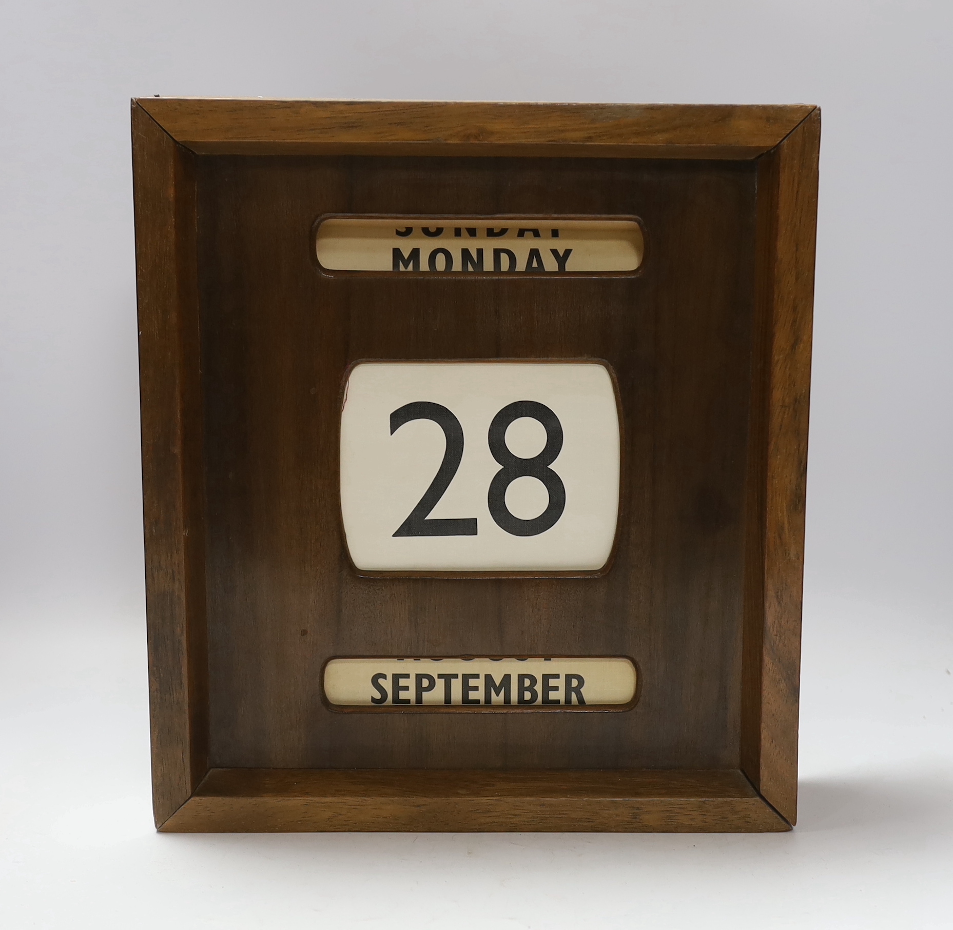 A 20th century wall hanging calendar, 33cm high